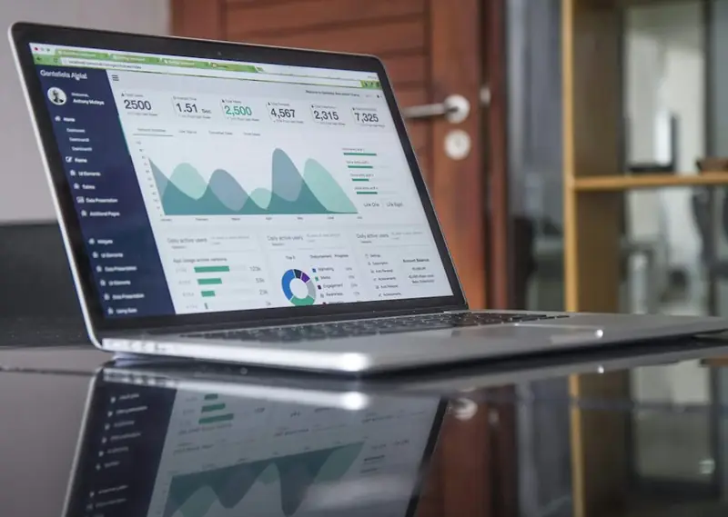 Laptop showing a cloud analytics dashboard — CloudMonitor